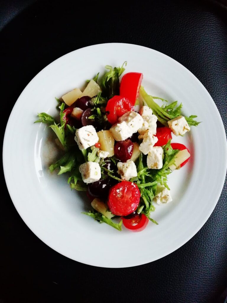 vegetable salad on white ceramic plate