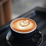 close up of coffee cup on table